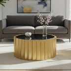 Gold coffee table with a black top in a living room setting