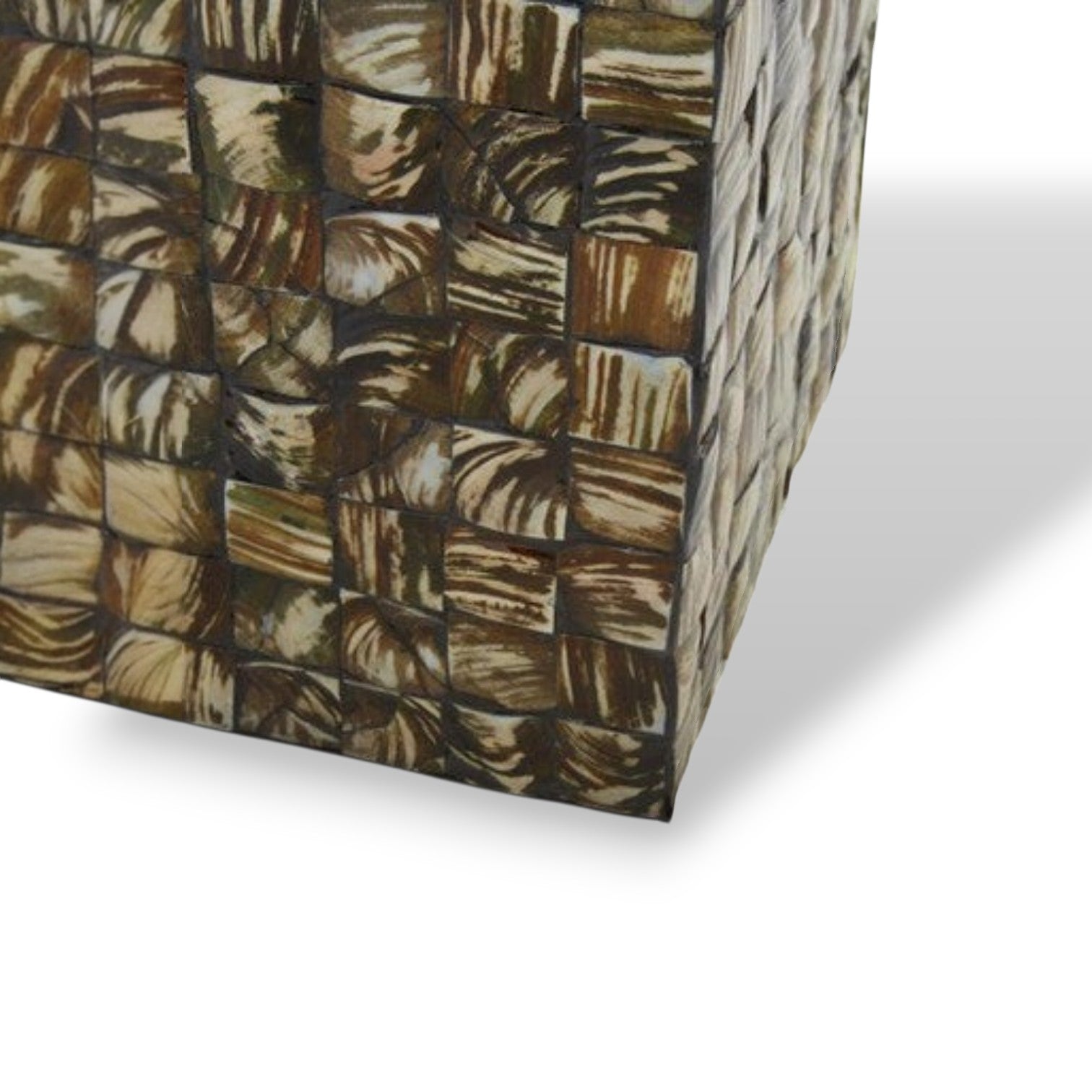 Close-up of a textured surface with a checkered pattern on a white background