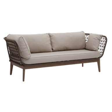 Beige outdoor sofa with wicker frame on a white background