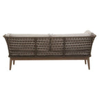 Wicker outdoor sofa with cushion on a white background