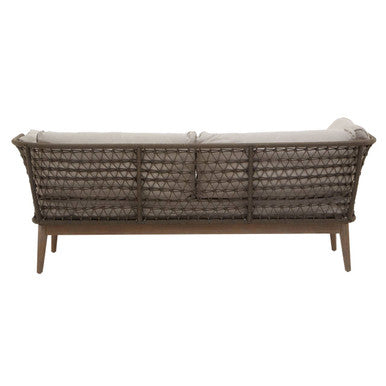 Wicker outdoor sofa with cushion on a white background