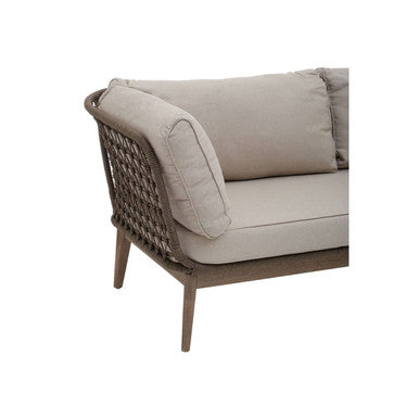 Beige outdoor sofa with wicker frame on a white background