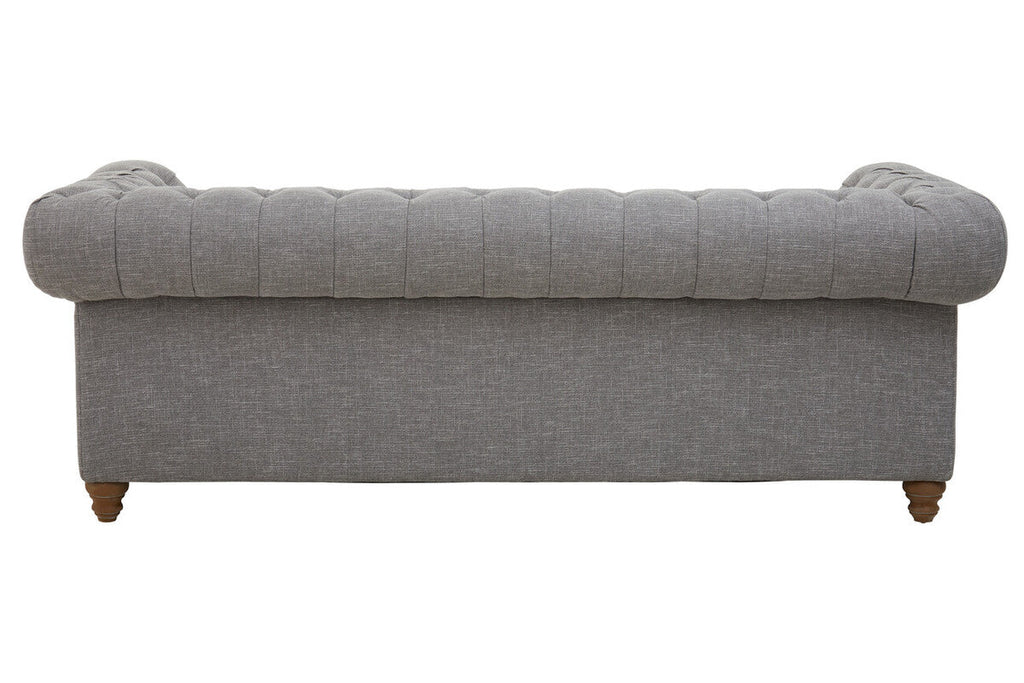 Gray upholstered bench with tufted backrest on a white background