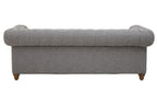 Gray upholstered bench with tufted backrest on a white background