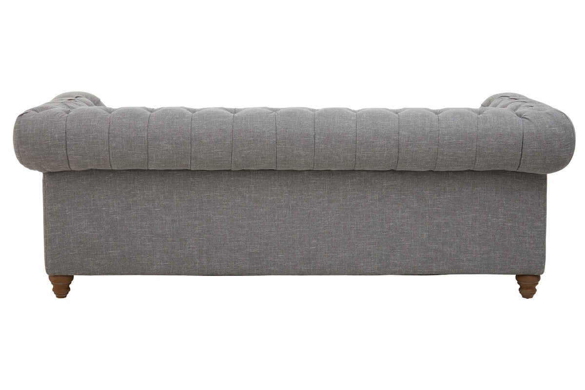 Gray upholstered bench with tufted backrest on a white background