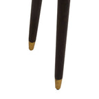 Two dark wooden legs with gold caps on a white background