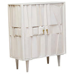 White cabinet with geometric design on a white background