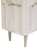 White cabinet with a geometric design on a white background