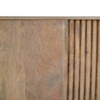Close-up of wooden panel with a ribbed texture