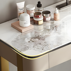Cosmetic products on a marble vanity table with a neutral background