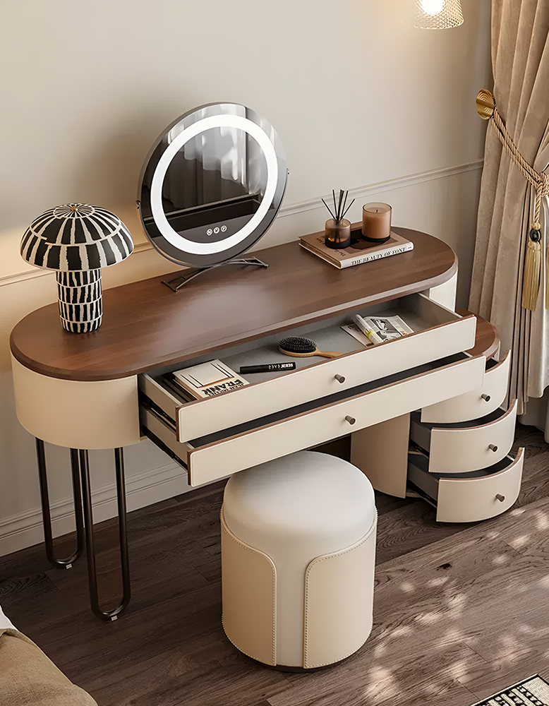 Modern vanity table with mirror, stool, and decorative items in a room setting.