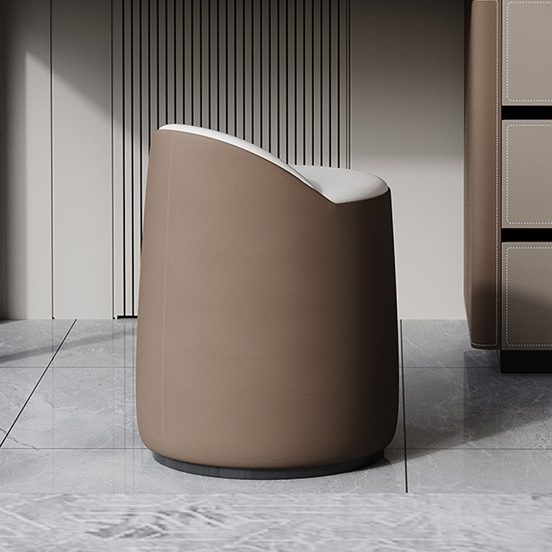 Modern brown stool with white cushion on a gray floor