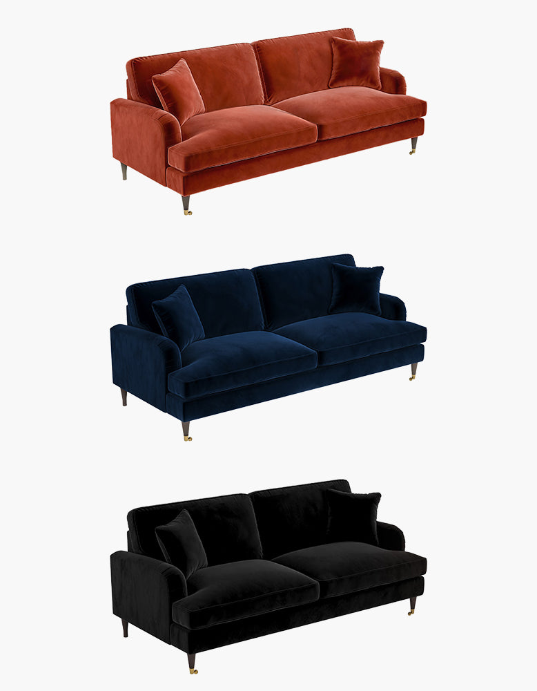 Three different colored sofas displayed on a white background.
