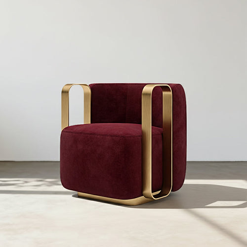 Maroon armchair with gold accents on a neutral background