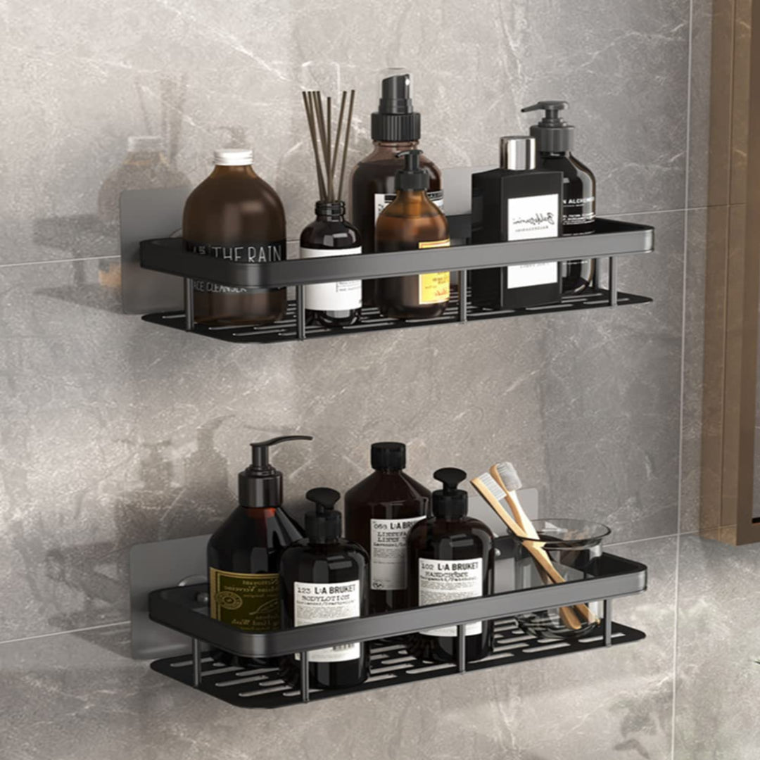 Bathroom shelves with various bottles and toiletries against a tiled wall.
