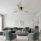 Modern living room with a ceiling fan, sectional sofa, and armchairs.