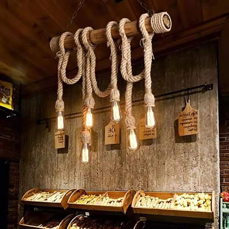 Rustic pendant light with hanging signs in a bakery setting