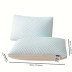 Two light blue pillows with measurements on a white background