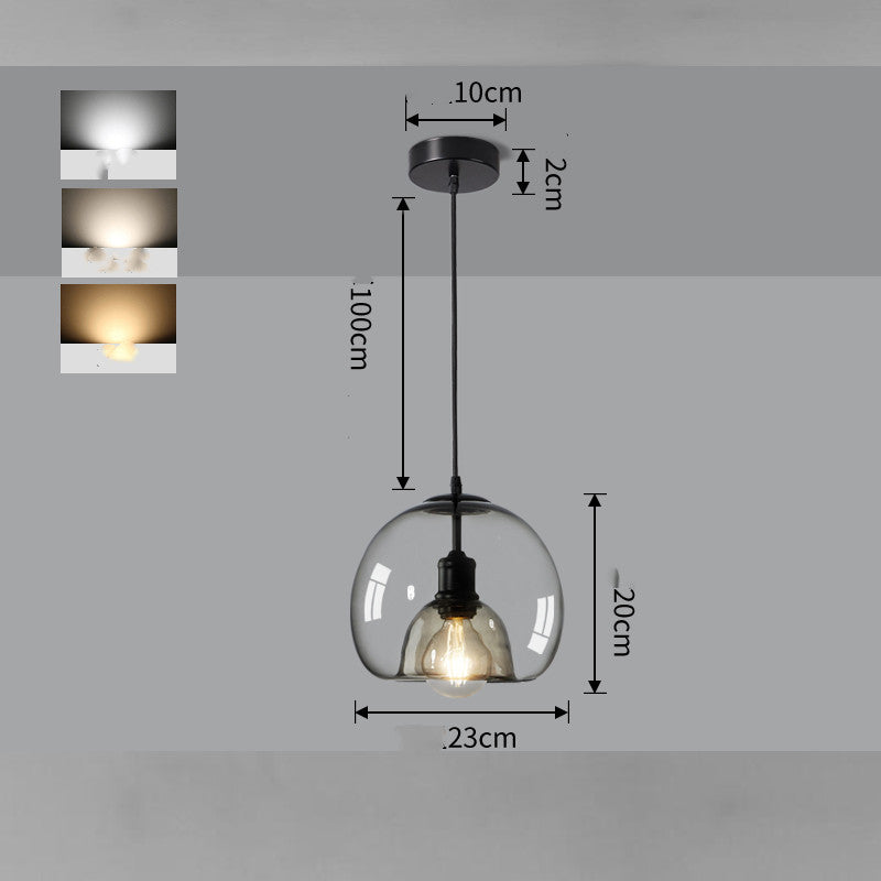 Pendant light with clear glass shade and black fixture, shown with measurements on a gray background.