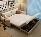 Beige sectional sofa with storage drawers in a living room setting.