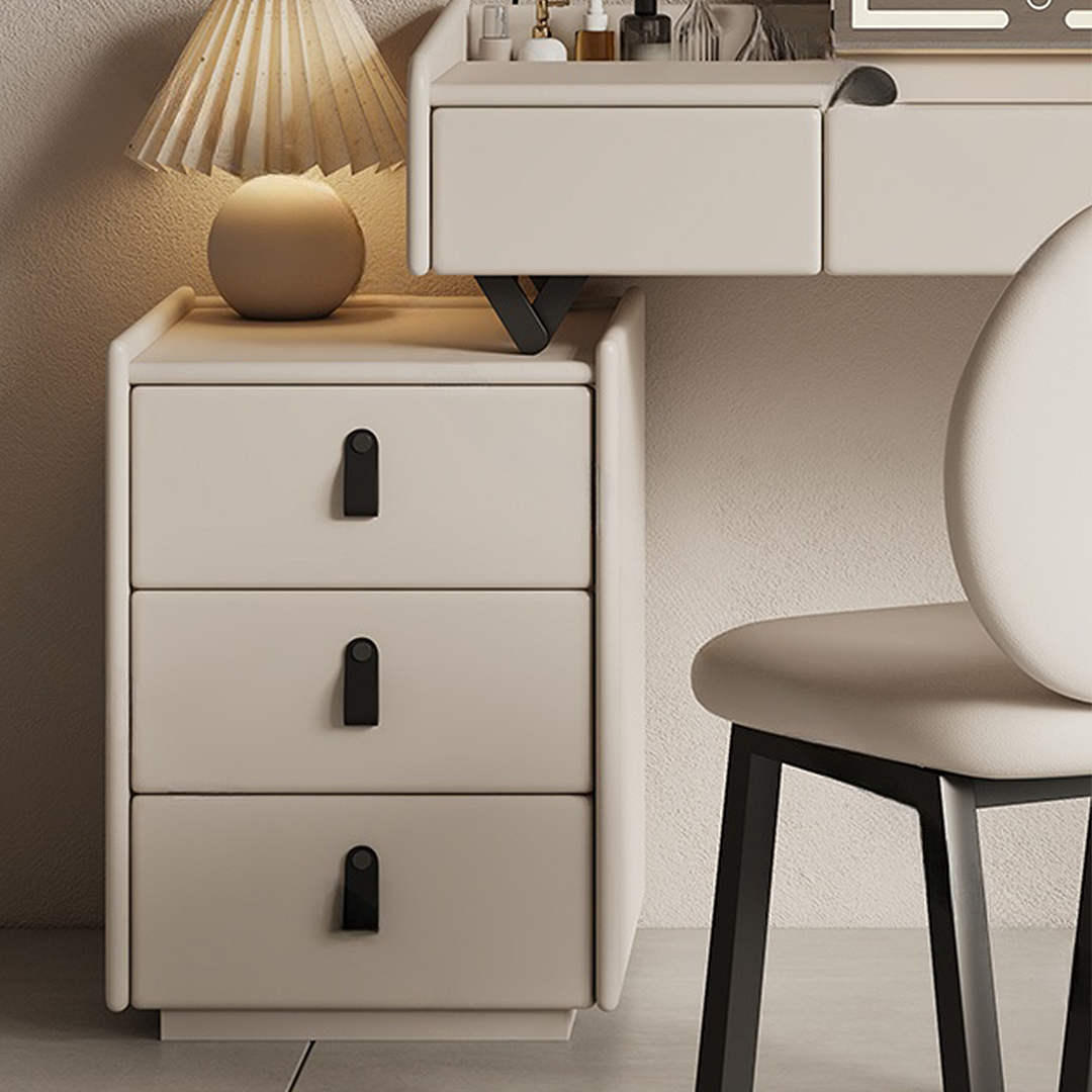 Beige desk with drawers and a chair in a room setting