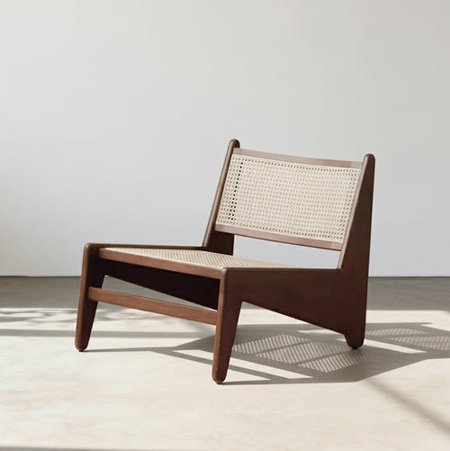 Wooden chair with woven backrest on a light background