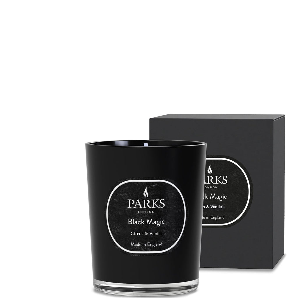 Black candle with 'Parks London' label and matching packaging on a white background