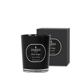 Black candle with 'Parks London' label and matching packaging on a white background