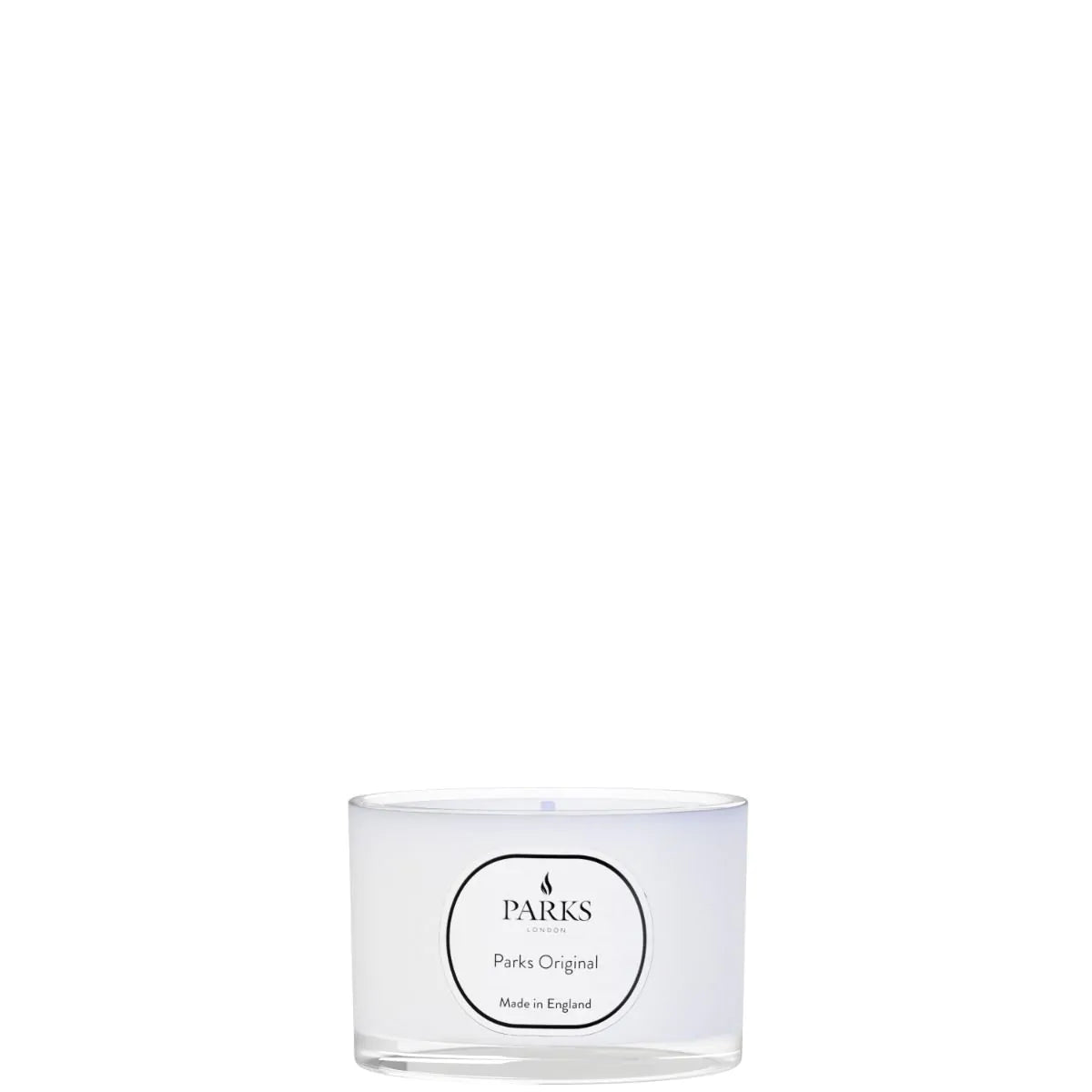 Clear glass candle with 'Parks' branding on a white background