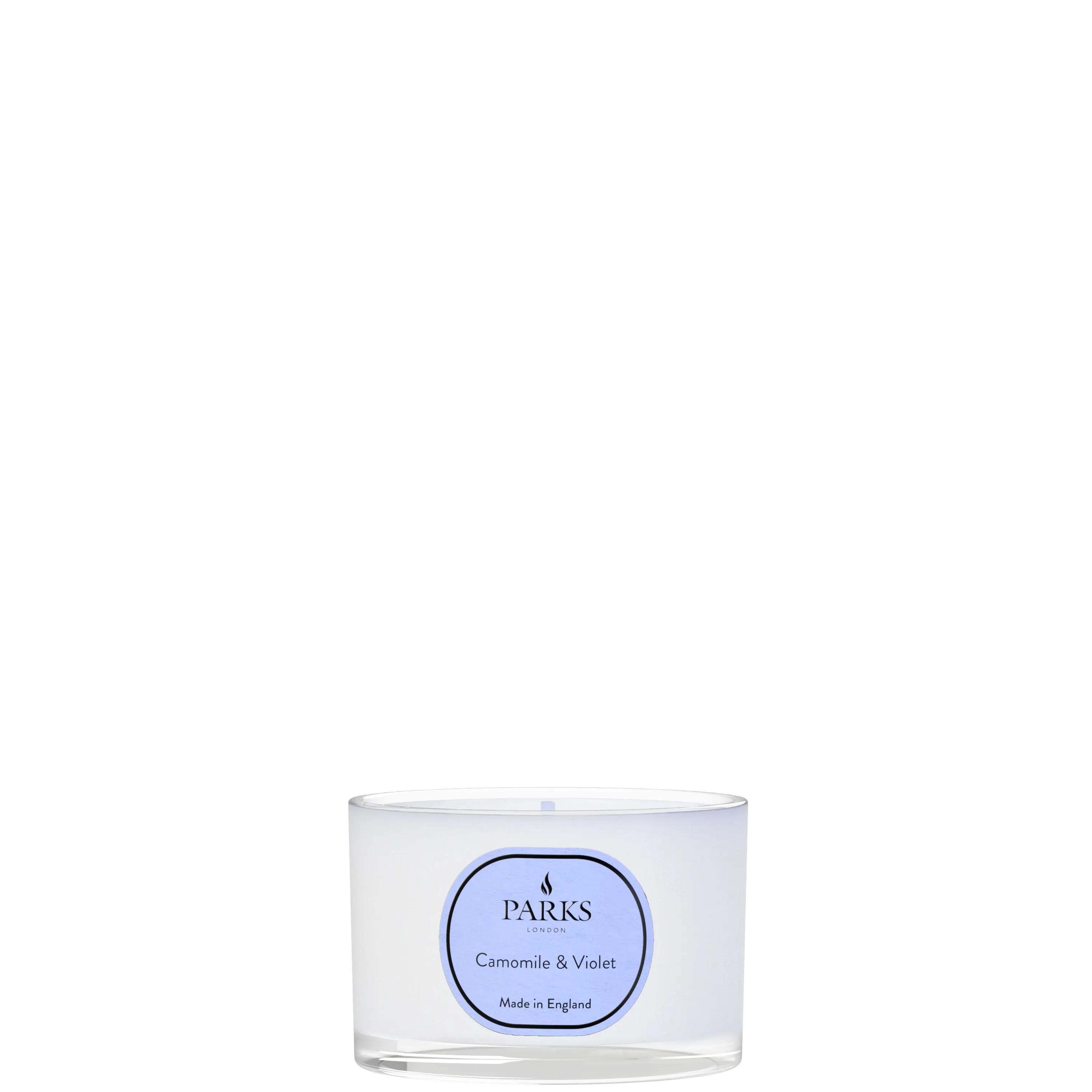 Candle in a glass jar with a blue label on a white background