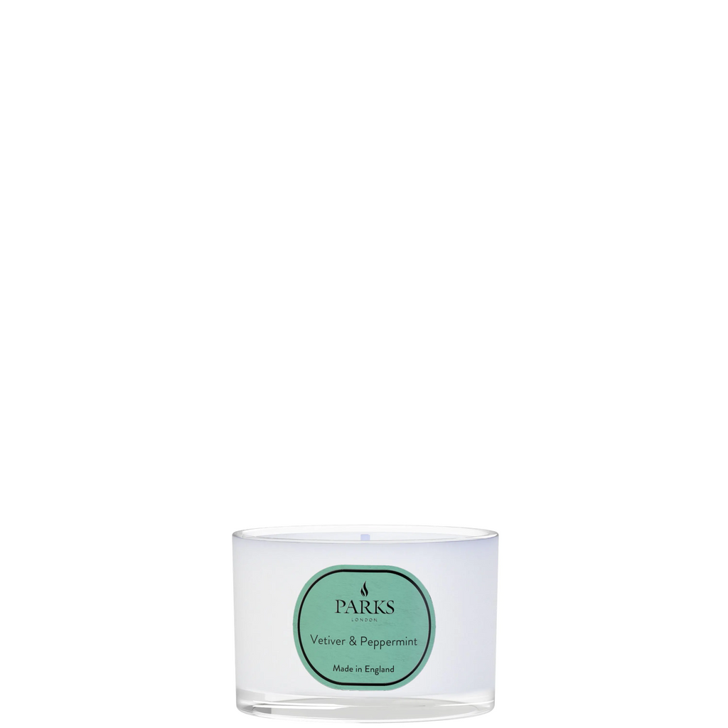 Parks candle with a green label on a white background