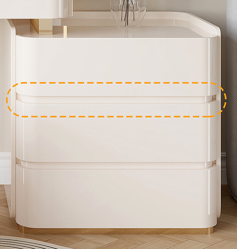 White storage cabinet with two drawers on a wooden floor.