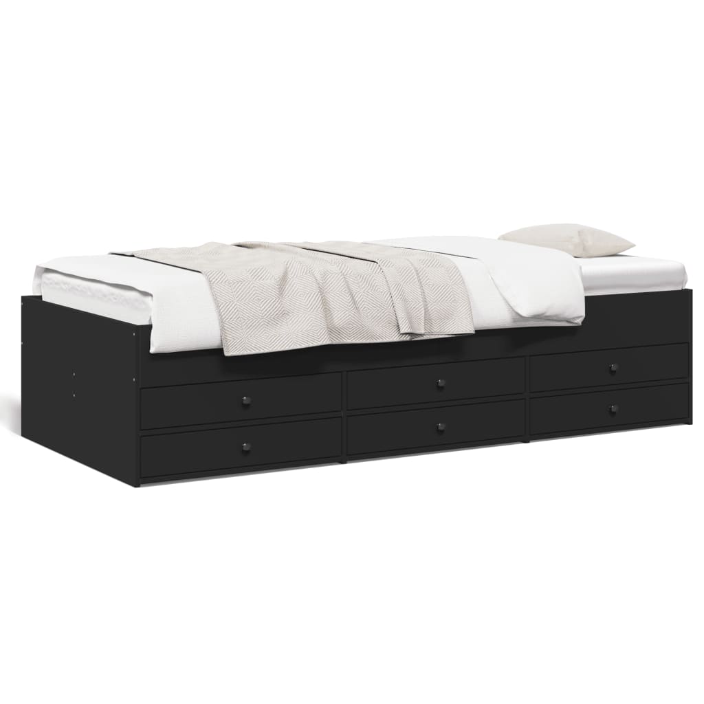 Black bed frame with white bedding on a white background