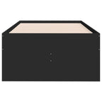 Black metal frame with wooden slats on a white background