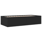 Black bed frame with wooden slats on a white background