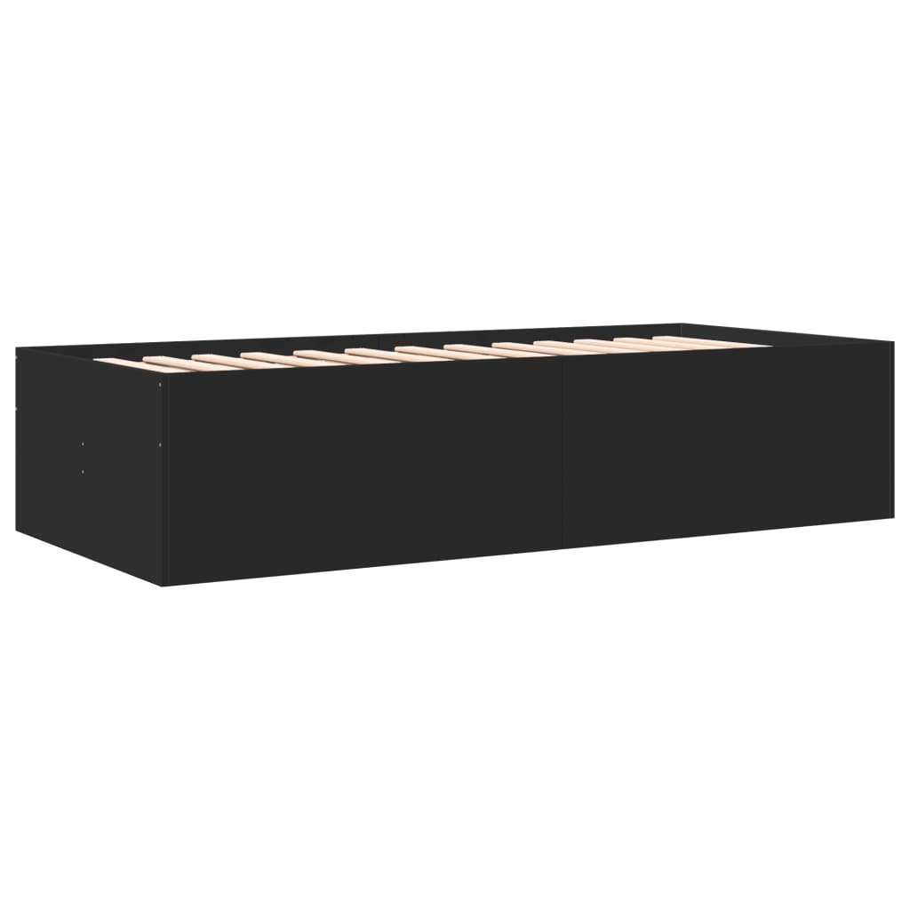 Black bed frame with wooden slats on a white background