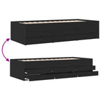 Black bed frame with multiple drawers on a white background