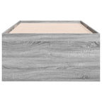 Wooden bed frame with a gray finish on a white background