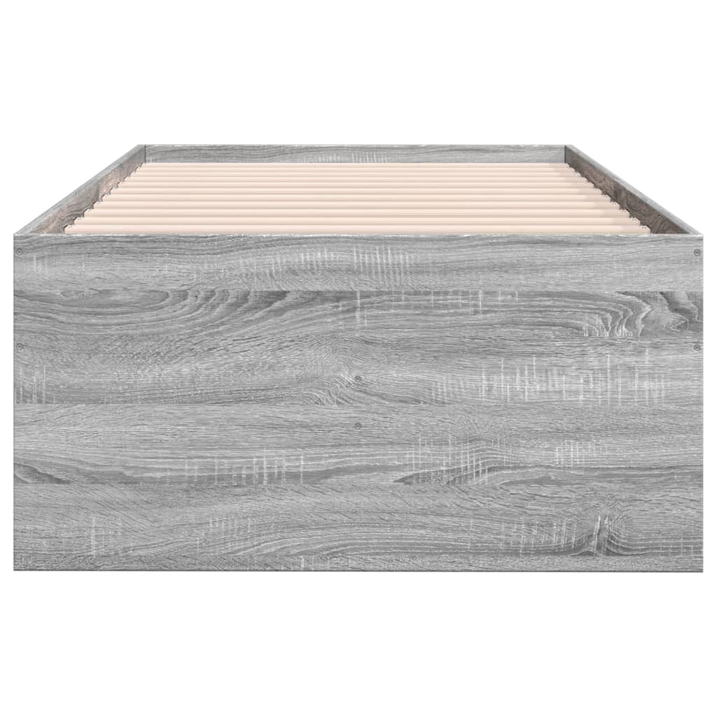Wooden bed frame with a gray finish on a white background