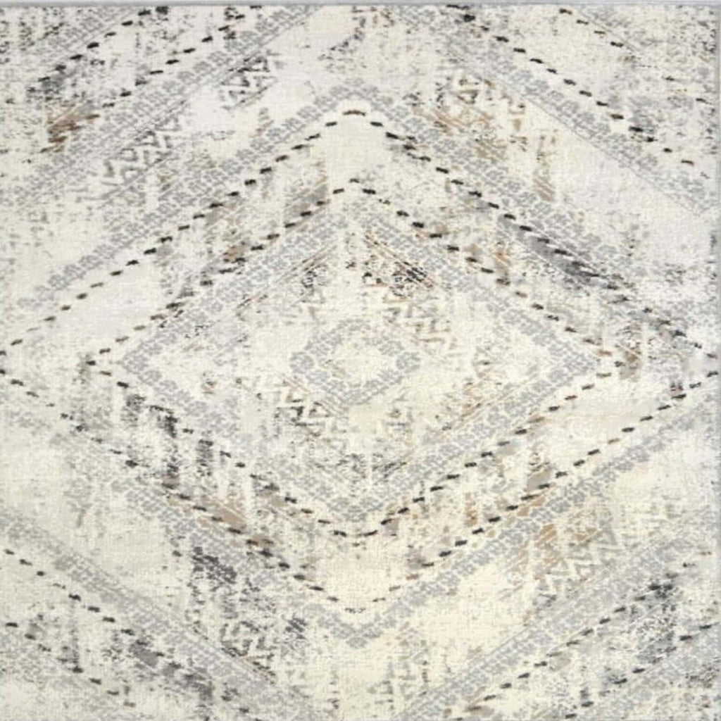 Patterned rug with geometric design on a neutral background