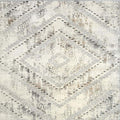 Patterned rug with geometric design on a neutral background