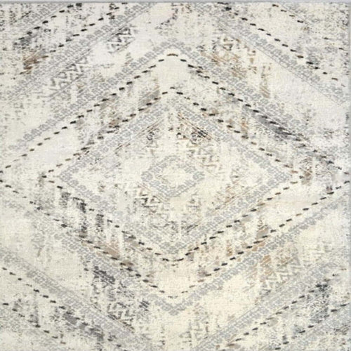 Patterned rug with geometric design on a neutral background