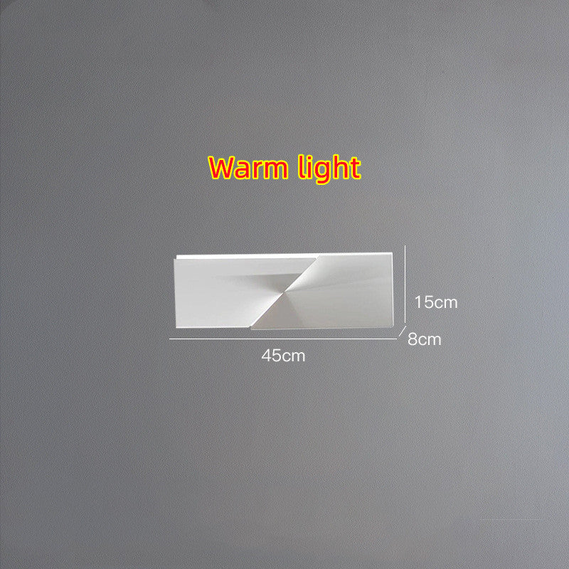 Wall-mounted light fixture with dimensions and 'Warm light' text on a gray background