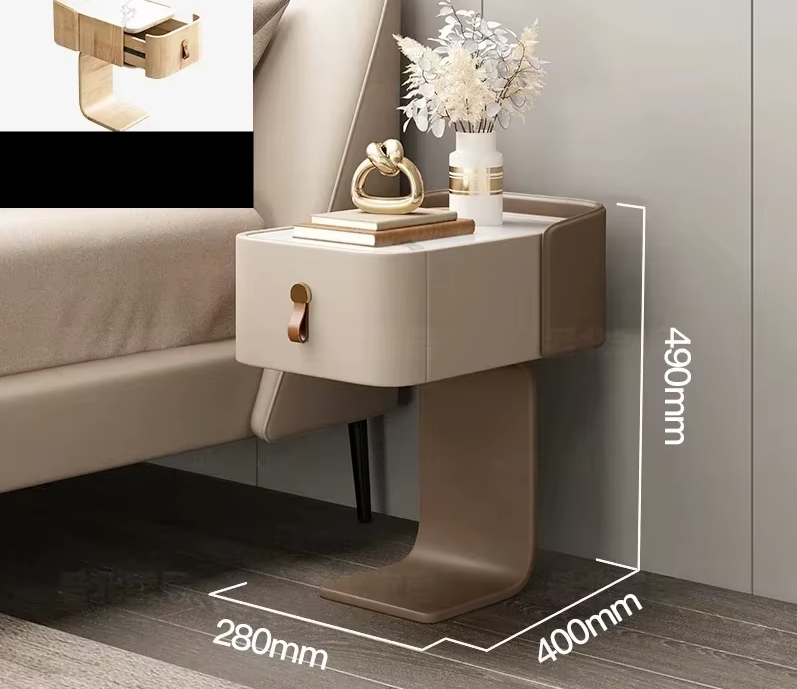 Beige nightstand with decorative items next to a bed, with dimensions displayed.