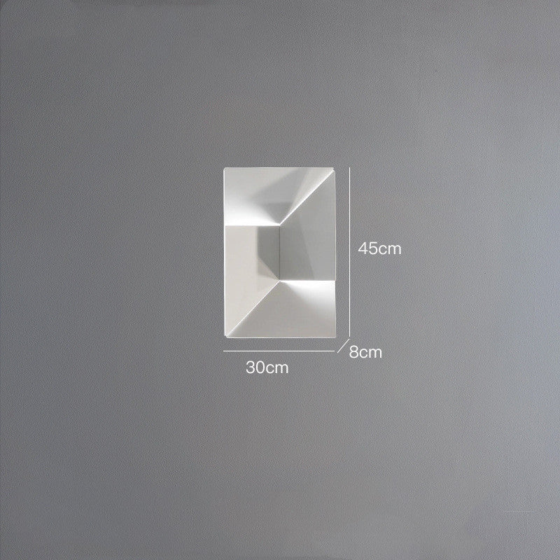 Wall-mounted light fixture with dimensions on a gray background