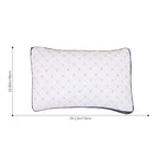 White pillow with gold geometric pattern and measurements on a white background