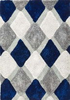 Geometric patterned rug with blue, gray, and white diamonds.