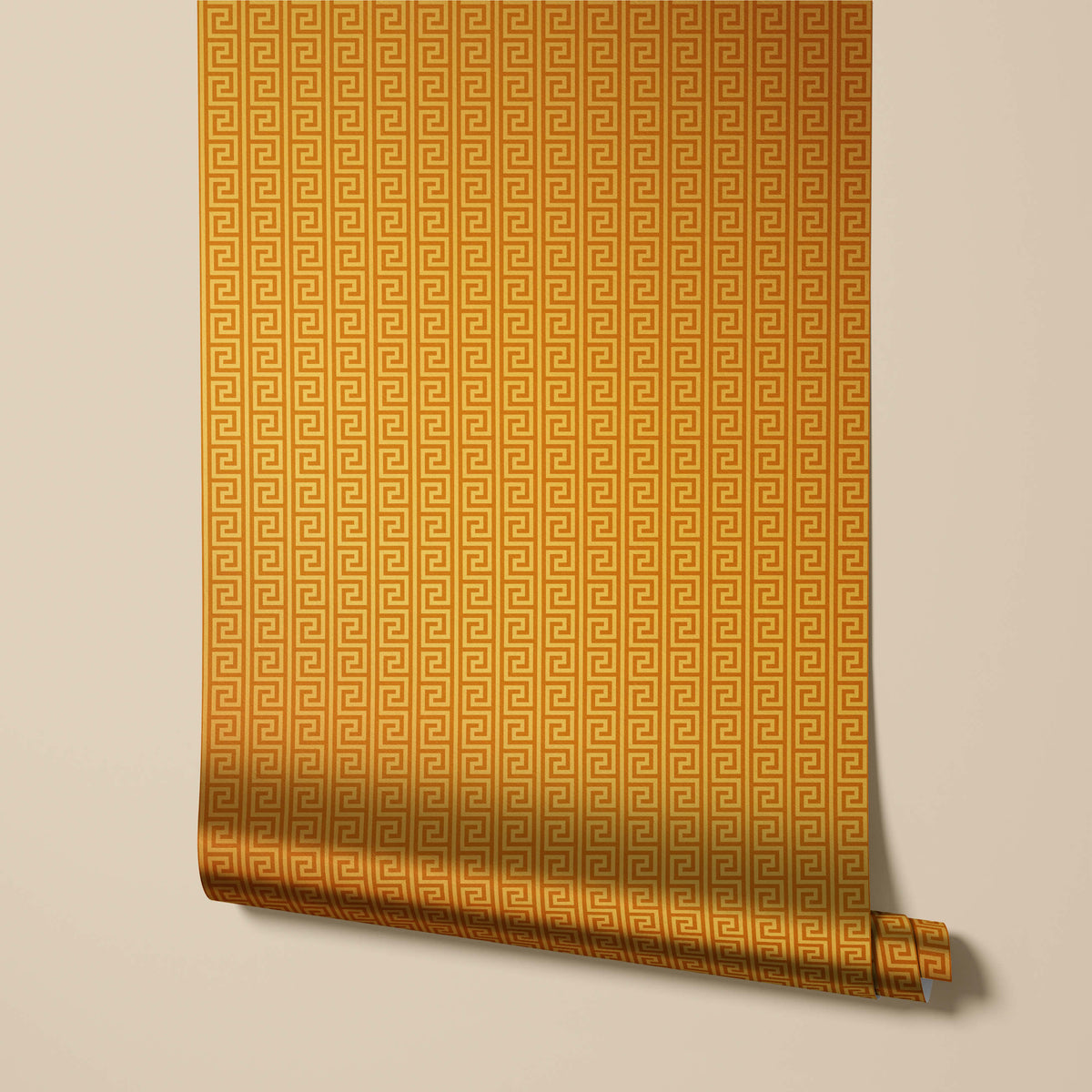 Roll of gold wallpaper with a geometric pattern on a beige background
