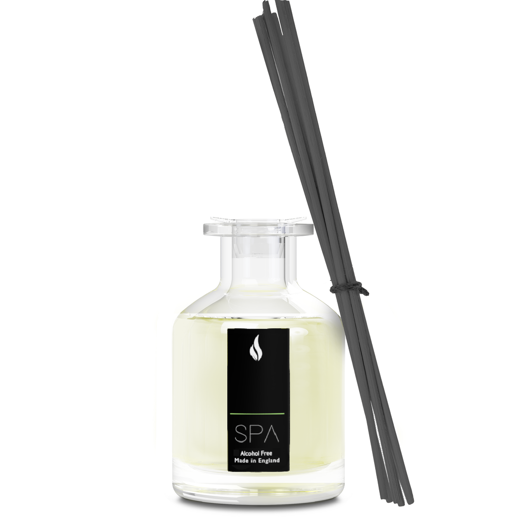 Reed diffuser with black sticks and 'SPA' label on a white background