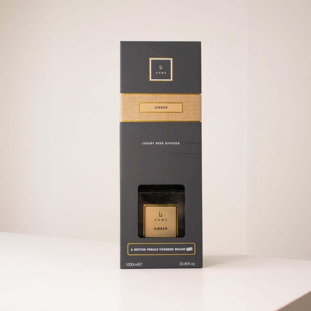 Black and gold box with a brand logo on a white background